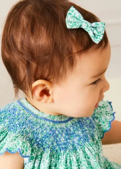 Lookbooks | Pepa London Adelaide Floral Hand Smocked Sleeveless Dress With Bloomers in Green (3mths-3yrs) | Openwork Cotton Cardigan in Cream (6mths-10yrs) | Leather Mary Jane Pram Shoes in Ivory (17-20EU) | Adelaide Floral Small Bow Hair Clip in Green | Openwork short socks White (0mths-8yrs) | Flower Fairies of the Spring Book in White