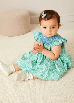 Lookbooks | Pepa London Adelaide Floral Hand Smocked Sleeveless Dress With Bloomers in Green (3mths-3yrs) | Openwork Cotton Cardigan in Cream (6mths-10yrs) | Leather Mary Jane Pram Shoes in Ivory (17-20EU) | Adelaide Floral Small Bow Hair Clip in Green | Openwork short socks White (0mths-8yrs) | Flower Fairies of the Spring Book in White