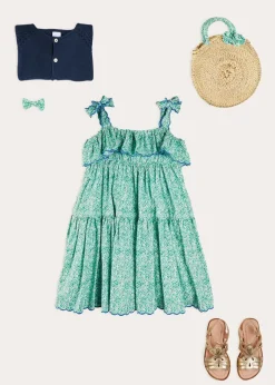 Lookbooks | Pepa London Adelaide Floral Tiered Tie Strap Dress in Green (4-12yrs) | Plain Cardigan in Navy (6mths-10yrs) | Metallic Strappy Leather Sandals in Gold (24-35EU) | Adelaide Floral Detail Raffia Bag in Green | Adelaide Floral Small Bow Hair Clip in Green
