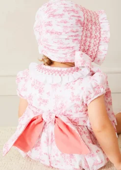 Rompers | Rompers | Pepa London Audrey Hand Smocked Double Breasted Short Sleeve Romper in Pink (6mths-2yrs)
