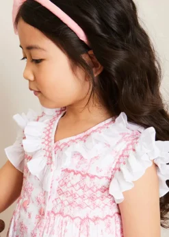 Lookbooks | Pepa London Audrey Toile Hand Smocked Double Breasted Sleeveless Dress in Pink (12mths-10yrs) | Peter Pan Collar Swing Coat in Pink (18mths-10yrs) | Openwork Cotton Cardigan in Cream (6mths-10yrs) | Leather Mary Jane Shoes in Pink (24-34EU) | Traditional Big Bow Tulle Hairband in Dusty Pink | Openwork short socks White (0mths-8yrs)