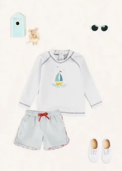 Lookbooks | Pepa London Boat Motif Long Sleeve Rashguard in Blue (2-6yrs) | Striped Contrast Trim Swim Shorts in Blue (2-10yrs) | Canvas Plimsolls in White (20-34EU) | Little Brother Beach Mouse Toy
