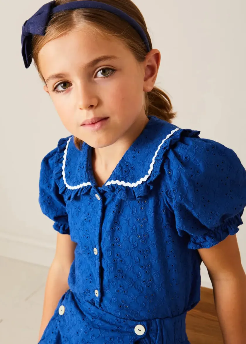 Lookbooks | Pepa London Broderie Anglaise Statement Collar Short Sleeve Blouse in Blue (4-12yrs) | Broderie Anglais Button Detail Shorts in Blue (4-12yrs) | Plain Cardigan in Navy (6mths-10yrs) | Openwork short socks White (0mths-8yrs) | Navy Linen Big Bow Hairband