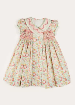 Dresses | Dresses | Pepa London Clementine Floral Hand Smocked Double Breasted Short Sleeve Dress in Coral (12mths-10yrs)