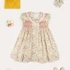 Lookbooks | Pepa London Clementine Floral Hand Smocked Double Breasted Short Sleeve Dress in Coral (12mths-10yrs) | Mary Jane Leather Baby Shoes in Ivory (20-24EU) | Clementine Floral Long Bow Hair Clip in Coral | Openwork short socks White (0mths-8yrs)