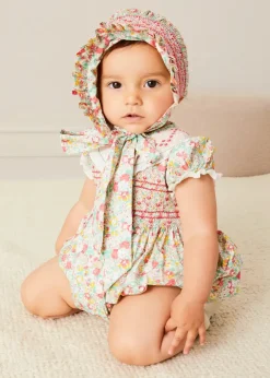 Lookbooks | Pepa London Clementine Floral Hand Smocked Double Breasted Short Sleeve Romper in Coral (6mths-3yrs) | Clementine Floral Hand Smocked Bonnet in Coral (S-M) | Openwork Cotton Cardigan in Cream (6mths-10yrs) | Leather Mary Jane Pram Shoes in Ivory (17-20EU) | Openwork short socks White (0mths-8yrs)