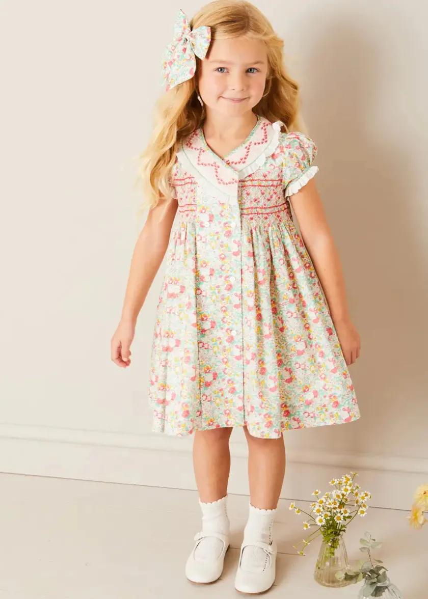 Dresses | Dresses | Pepa London Clementine Floral Hand Smocked Double Breasted Short Sleeve Dress in Coral (12mths-10yrs)
