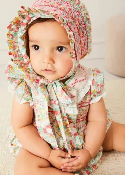 Rompers | Rompers | Pepa London Clementine Floral Hand Smocked Double Breasted Short Sleeve Romper in Coral (6mths-3yrs)