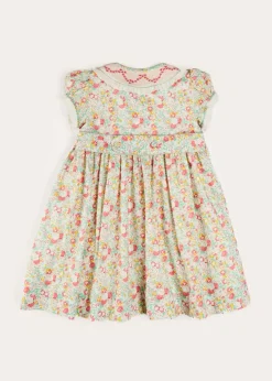 Dresses | Dresses | Pepa London Clementine Floral Hand Smocked Double Breasted Short Sleeve Dress in Coral (12mths-10yrs)