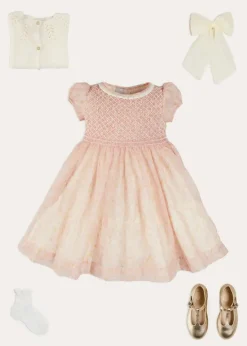 Lookbooks | Pepa London Constance Floral Hand Smocked Short Sleeve Party Dress in Pink (12mths-10yrs) | Openwork Cotton Cardigan in Cream (6mths-10yrs) | Leather Charlotte Shoes in Gold (24-35EU) | Tulle Long Bow Clip In Cream | Celebration Short Socks with Ruffle- Cream (0mths-10yrs)