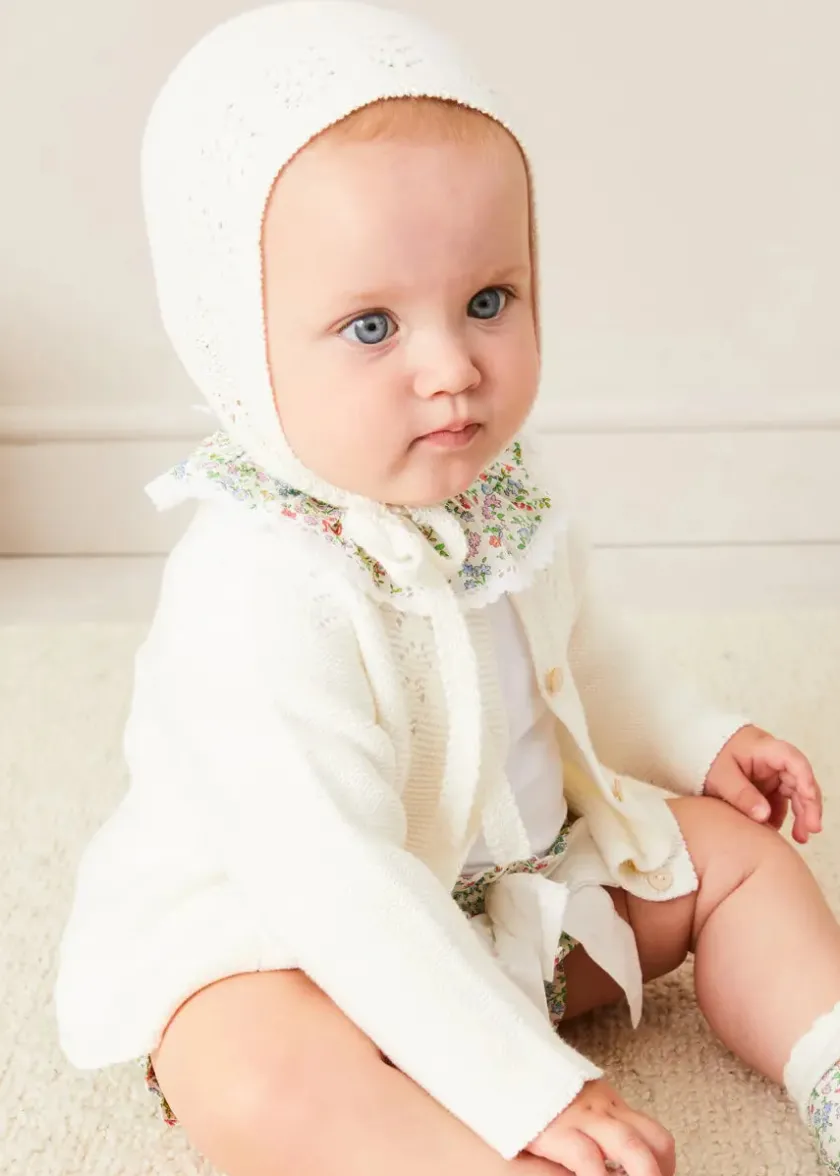 Lookbooks | Pepa London Cordelia Embroidered Double Collar Bodysuit in Pink Made with Liberty Fabric (1m-3yrs) | Cordelia Floral Bloomer with Bow in Pink Made with Liberty Fabric (1m-2yrs) | Openwork Cotton Cardigan in Cream (6mths-10yrs) | Openwork Cotton Knitted Bonnet in Cream (S-L) | Cordelia Liberty Floral Mary Jane Pram Shoes in Pink (17-20EU) | Cordelia Liberty Floral Dummy Clip in Pink | Openwork short socks White (0mths-8yrs)