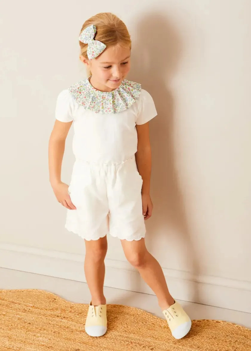 Lookbooks | Pepa London Cordelia Floral Collar Top in Pink Made with Liberty Fabric (2-10yrs) | Scallop Trim Embroidered Shorts in White (2-10yrs) | Floral Openwork Cotton Cardigan in Pink (2-10yrs) | Canvas Plimsolls in Cream (20-35EU) | Cordelia Floral Medium Bow Clip in Pink Made with Liberty Fabric | The Tale Of Kitty In Boots Book in White