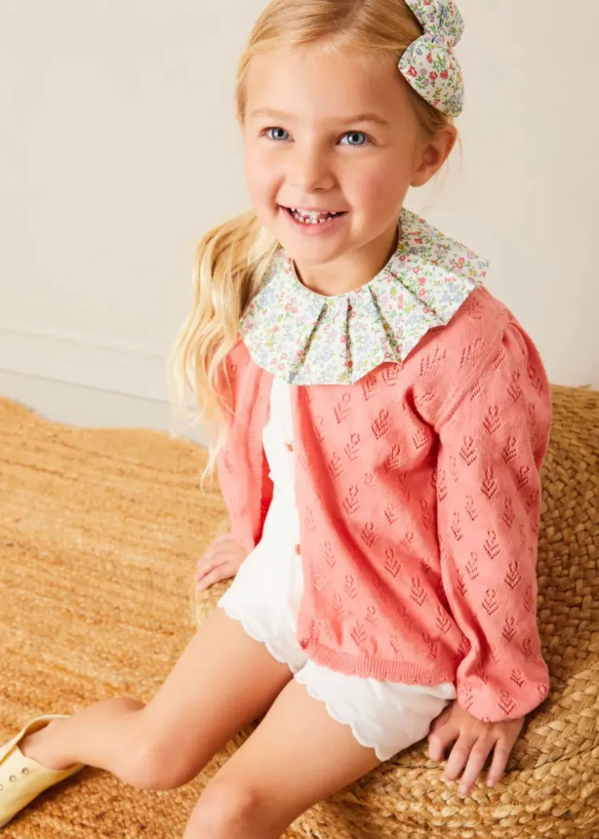 Lookbooks | Pepa London Cordelia Floral Collar Top in Pink Made with Liberty Fabric (2-10yrs) | Scallop Trim Embroidered Shorts in White (2-10yrs) | Floral Openwork Cotton Cardigan in Pink (2-10yrs) | Canvas Plimsolls in Cream (20-35EU) | Cordelia Floral Medium Bow Clip in Pink Made with Liberty Fabric | The Tale Of Kitty In Boots Book in White
