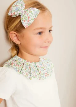 Lookbooks | Pepa London Cordelia Floral Collar Top in Pink Made with Liberty Fabric (2-10yrs) | Scallop Trim Embroidered Shorts in White (2-10yrs) | Floral Openwork Cotton Cardigan in Pink (2-10yrs) | Canvas Plimsolls in Cream (20-35EU) | Cordelia Floral Medium Bow Clip in Pink Made with Liberty Fabric | The Tale Of Kitty In Boots Book in White