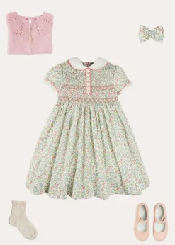 Lookbooks | Pepa London Cordelia Floral Hand-Smocked Short Sleeve Dress in Pink Made with Liberty Fabric (12m-6yrs) | Openwork Cotton Cardigan in Pink (6mths-10yrs) | Leather Mary Jane Shoes in Pink (24-34EU) | Cordelia Floral Medium Bow Clip in Pink Made with Liberty Fabric | Celebration Short Socks with ruffle - Sand (0mths-10yrs)
