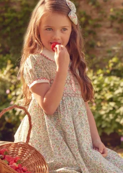 Lookbooks | Pepa London Cordelia Floral Hand-Smocked Short Sleeve Dress in Pink Made with Liberty Fabric (12m-6yrs) | Openwork Cotton Cardigan in Pink (6mths-10yrs) | Leather Mary Jane Shoes in Pink (24-34EU) | Cordelia Floral Medium Bow Clip in Pink Made with Liberty Fabric | Celebration Short Socks with ruffle - Sand (0mths-10yrs)