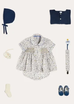 Lookbooks | Pepa London Ellis Liberty Print Hand Smocked Short Sleeve Shirt in Blue (6mths-4yrs) | Ellis Floral Bloomer in Blue Made with Liberty Fabric (1m-3yrs) | Plain Cardigan in Navy (6mths-10yrs) | Openwork Knitted Bonnet in Navy (S-L) | Leather T-Bar Pram Shoes in Classic Blue (17-20EU) | Ribbed Short Socks - Cream (0mths-10yrs)