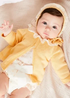 Lookbooks | Pepa London Esme Floral Ruffle Collar Long Sleeve Blouse in White (1-12mths) | Esme Floral Bow Detail Bloomers in White (1-12mths) | Openwork Detail Cotton Baby Cardigan in Tangerine (1-12mths) | Lace Detail Knitted Bonnet in Tangerine (1-12mths) | Celebration Ribbon Detail Mary Jane Pram Shoes in Beige (17-20EU) | Esme Floral Dummy Clip in White | Little Library Book in White