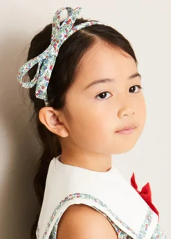 Lookbooks | Pepa London Evelyn Floral Sleeveless Bow Detail Trapeze Dress in Red (12mths-8yrs) | Openwork Cotton Cardigan in Cream (6mths-10yrs) | Evelyn Floral Thin Bow Hairband in Red | Openwork short socks White (0mths-8yrs)