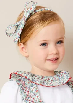 Lookbooks | Pepa London Evelyn Floral Smocked Detail Skirt With Braces in Red (18mths-6yrs) | Evelyn Floral Ruffle Collar Top in Red (2-10yrs) | Statement Collar Floral Embroidery Cardigan in Navy (2-10yrs) | Leather Mary Jane Baby Shoes in French Blue (20-26EU) | Evelyn Floral Thin Bow Hairband in Red | Ribbed Shorts Socks Red (0mths-10yrs)