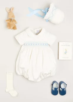 First Outfits | Gifting | Pepa London Gift boxes | Off White and Blue Hand Smocked Baby Bonnet | Plain high socks - Cream (0mths-10yrs) | Leather T-Bar Pram Shoes in Classic Blue (17-20EU) | My First Bunny in a Box - Blue