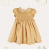 Lookbooks | Pepa London Hand Smocked Peter Pan Collar Short Sleeve Dress in Beige (12mths-10yrs) | Openwork Cotton Cardigan in Cream (6mths-10yrs) | Girls Ivory Leather Mary Jane Shoes (20-34EU) | Traditional Big Bow Tulle Hairband in Ivory | Celebration Short Socks with Ruffle- Cream (0mths-10yrs) | Tulle Long Bow Clip In Cream