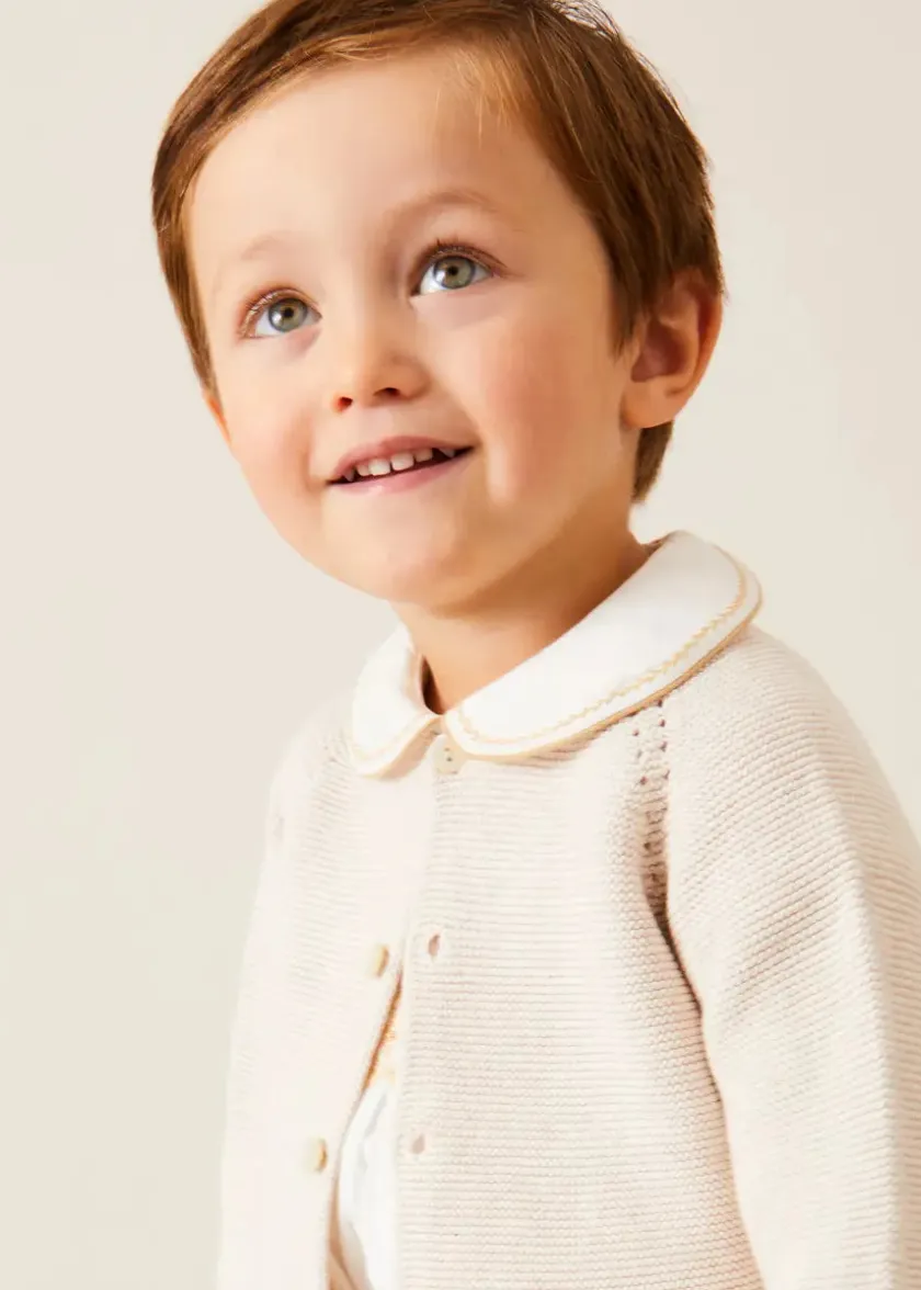Lookbooks | Pepa London Hand Smocked Peter Pan Collar Short Sleeve Two Piece Set in Beige (18mths-6yrs) | Plain Cardigan in Cream (6mths-10yrs) | T-Bar Leather Baby Shoes in Ivory (20-24EU) | Cotton Short Socks Cream (0mths-10yrs)