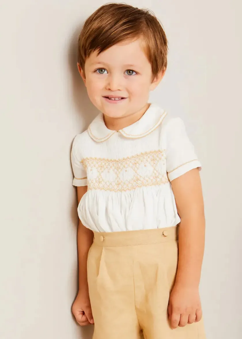 Lookbooks | Pepa London Hand Smocked Peter Pan Collar Short Sleeve Two Piece Set in Beige (18mths-6yrs) | Plain Cardigan in Cream (6mths-10yrs) | T-Bar Leather Baby Shoes in Ivory (20-24EU) | Cotton Short Socks Cream (0mths-10yrs)