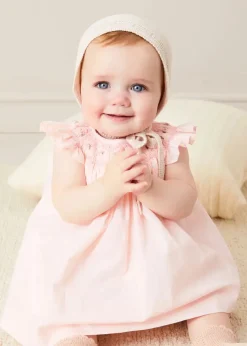 Lookbooks | Pepa London Hand Smocked Sleeveless Dress With Bloomers in Pink (1-12mths) | Openwork Detail Baby Cardigan in Pink (1-12mths) | Openwork Knitted Bonnet in Beige(S-L) | Cordelia Liberty Floral Mary Jane Pram Shoes in Pink (17-20EU) | Cordelia Liberty Floral Dummy Clip in Pink | Knitted Bunny Teether in Beige | BIBS Dummy in Pink
