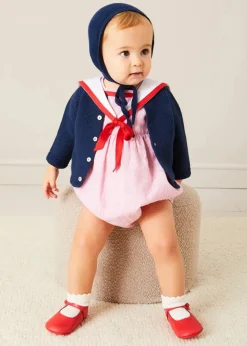 Lookbooks | Pepa London Lawrence Striped Mariner Collar Short Sleeve Romper in Red (6mths-3yrs) | Openwork Knitted Bonnet in Navy (S-L) | Plain Cardigan in Navy (6mths-10yrs) | Leather Mary Jane Pram Shoes in Red (17-20EU) | Openwork short socks White (0mths-8yrs)