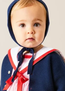 Lookbooks | Pepa London Lawrence Striped Mariner Collar Short Sleeve Romper in Red (6mths-3yrs) | Openwork Knitted Bonnet in Navy (S-L) | Plain Cardigan in Navy (6mths-10yrs) | Leather Mary Jane Pram Shoes in Red (17-20EU) | Openwork short socks White (0mths-8yrs)