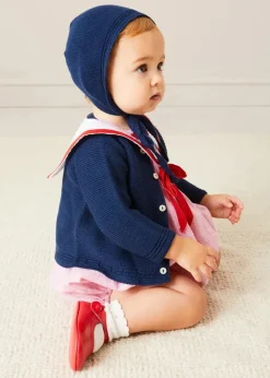 Lookbooks | Pepa London Lawrence Striped Mariner Collar Short Sleeve Romper in Red (6mths-3yrs) | Openwork Knitted Bonnet in Navy (S-L) | Plain Cardigan in Navy (6mths-10yrs) | Leather Mary Jane Pram Shoes in Red (17-20EU) | Openwork short socks White (0mths-8yrs)