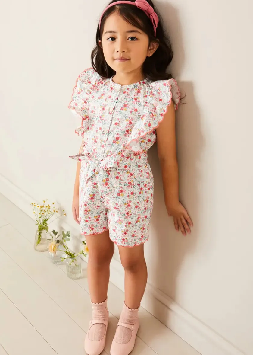 Up To 12 Years | Pepa London Louisa Floral Ruffle Detail Playsuit in Pink (4-12yrs)