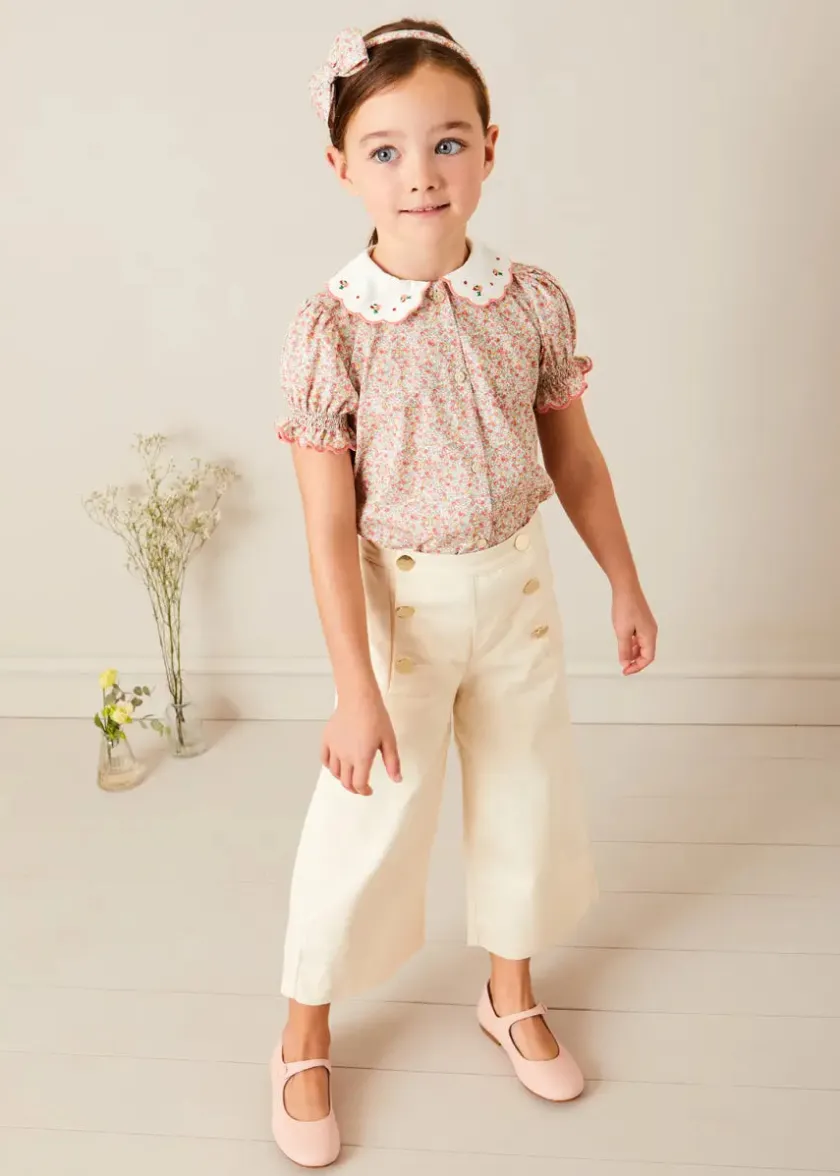 Lookbooks | Pepa London Mabel Floral Embroidered Short Sleeve Blouse in Coral (18mths-10yrs) | Wide Leg Front Button Trousers in Beige (2-10yrs) | Floral Openwork Cotton Cardigan in Pink (2-10yrs) | Openwork short socks - Dusty Pink (0mths-10yrs) | Leather Mary Jane Shoes in Pink (24-34EU) | Mabel Floral Hairband in Coral
