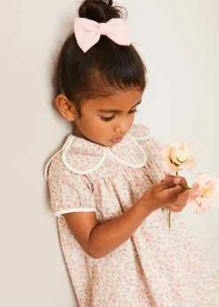 Lookbooks | Pepa London Mabel Floral Statement Collar Short Sleeve Dress in Coral (12mths-10yrs) | Plain Cardigan in Cream (6mths-10yrs) | Mary Jane Baby Shoes in Pink (20-26EU) | Mabel Floral Hairband in Coral | Openwork short socks White (0mths-8yrs)