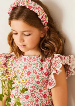 Lookbooks | Pepa London Margot Floral Sleeveless Hand-Smocked Dress in Red Made with Liberty Fabric (4-12yrs) | Openwork Cotton Cardigan in Cream (6mths-10yrs) | Girls Ivory Leather Mary Jane Shoes (20-34EU) | Margot Liberty Floral Scrunchie Hairband in Red | Openwork short socks White (0mths-8yrs)