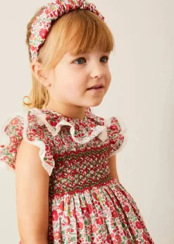 Lookbooks | Pepa London Margot Hand-Smocked Dress in Red Made with Liberty Fabric (12m-6yrs) | Openwork Cotton Cardigan in Cream (6mths-10yrs) | Mary Jane Leather Baby Shoes in Ivory (20-24EU) | Margot Liberty Floral Scrunchie Hairband in Red | Openwork short socks White (0mths-8yrs)