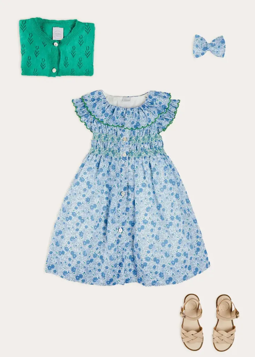 Lookbooks | Pepa London Olivia Floral Smocked Ruffle Collar Sleeveless Dress in Blue (12mths-10yrs) | Floral Openwork Cotton Cardigan in Green (2-10yrs) | Leather Woven Detail Sandals in Beige (24-35EU) | Olivia Floral Medium Bow Hair Clip in Blue