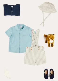 Lookbooks | Pepa London Peter Pan Collar Trim Detail Short Sleeve Shirt in Blue (12mths-5yrs) | Brompton Striped Shorts With Braces in Beige (12mths-4yrs) | Plain Cardigan in Navy (6mths-10yrs) | Woven T-Bar Baby Shoes in Navy (20-26EU) | Brompton Striped Sun Hat in Beige (XS-M) | Ribbed Short Socks - Cream (0mths-10yrs)