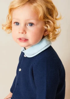 Lookbooks | Pepa London Peter Pan Collar Trim Detail Short Sleeve Shirt in Blue (12mths-5yrs) | Brompton Striped Shorts With Braces in Beige (12mths-4yrs) | Plain Cardigan in Navy (6mths-10yrs) | Woven T-Bar Baby Shoes in Navy (20-26EU) | Brompton Striped Sun Hat in Beige (XS-M) | Ribbed Short Socks - Cream (0mths-10yrs)
