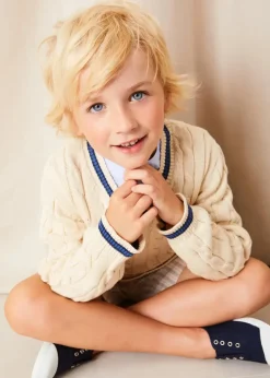 Lookbooks | Pepa London Plain Mao Collar Long Sleeve Shirt in Blue (4-10yrs) | Brompton Striped Shorts in Beige (4-10yrs) | Cable Knit V-Neck Jumper in Cream (4-10yrs) | Canvas Plimsolls in Navy (20-35EU) | Cream Boy's Belt