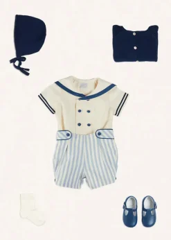 Lookbooks | Pepa London Regency Stripe Mariner Collar Two Piece Set With Bloomers in Blue (6mths-3yrs) | Plain Cardigan in Navy (6mths-10yrs) | Openwork Knitted Bonnet in Navy (S-L) | T-Bar Baby Shoes in Blue (20-26EU) | Cotton Short Socks Cream (0mths-10yrs) | Limited Edition Merrythought & Pepa Teddy Bear With Regency Striped Bow in Blue (S-L)