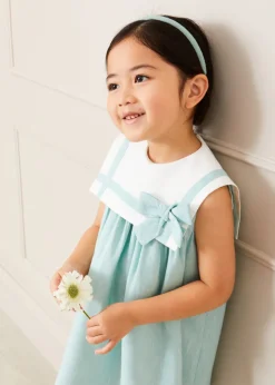 Lookbooks | Pepa London Sleeveless Trapeze Dress With Bow Detail in Green (12mths-10yrs) | Green Linen Hairband | Mary Jane Leather Baby Shoes in Ivory (20-24EU) | Openwork short socks White (0mths-8yrs) | Chick Toy in Yellow