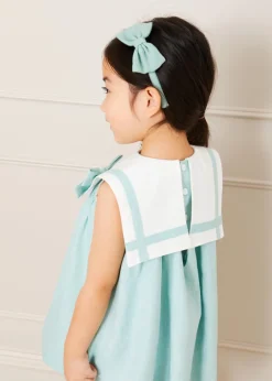 Lookbooks | Pepa London Sleeveless Trapeze Dress With Bow Detail in Green (12mths-10yrs) | Green Linen Hairband | Mary Jane Leather Baby Shoes in Ivory (20-24EU) | Openwork short socks White (0mths-8yrs) | Chick Toy in Yellow